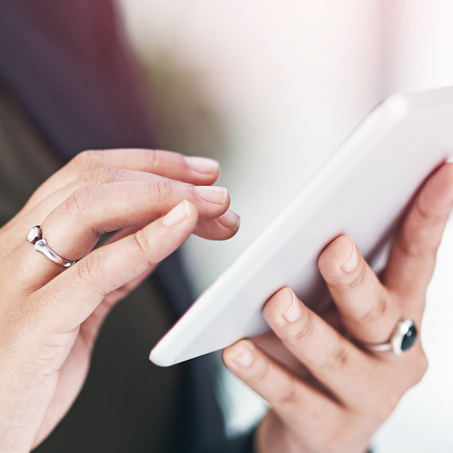 FullStack header image close up woman using tablet