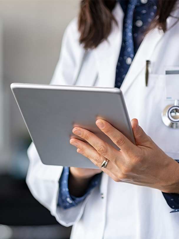 doctor holding a tablet