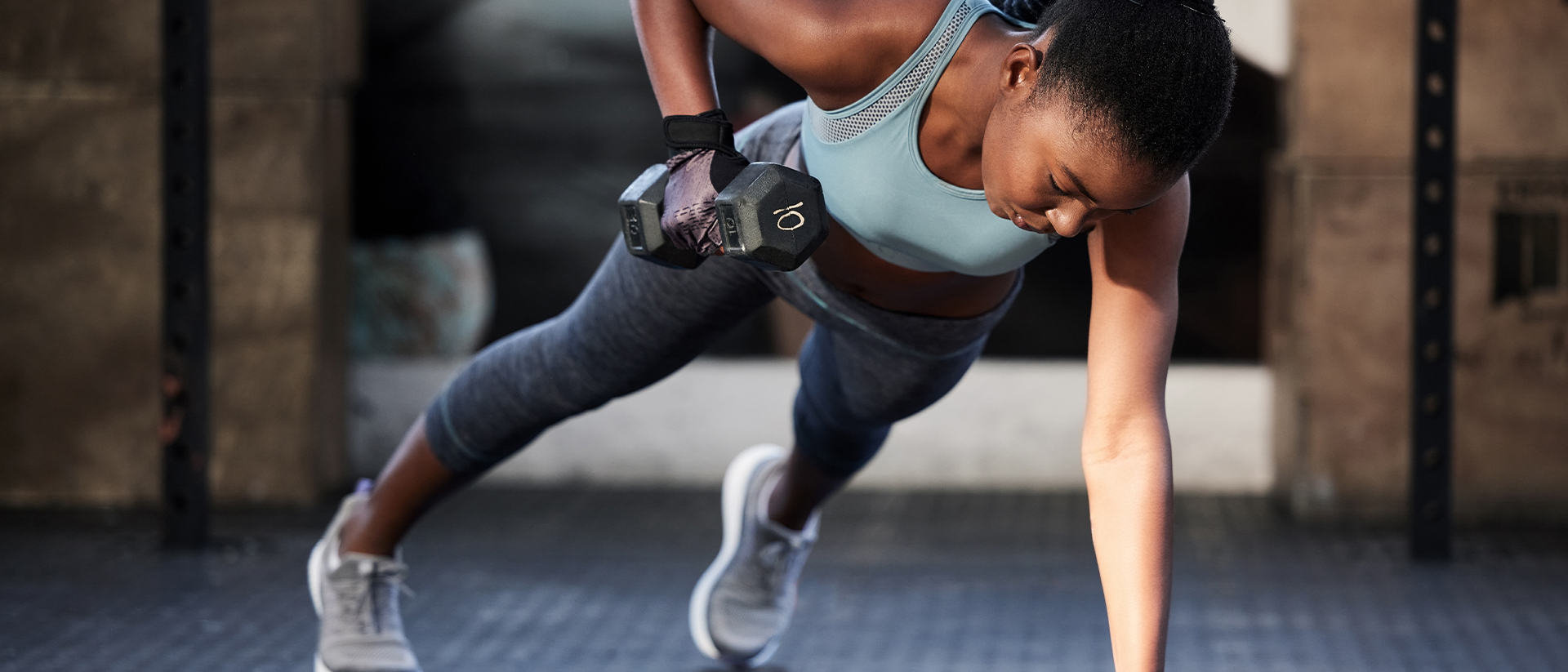 CDM Fitness header image woman lifting weights