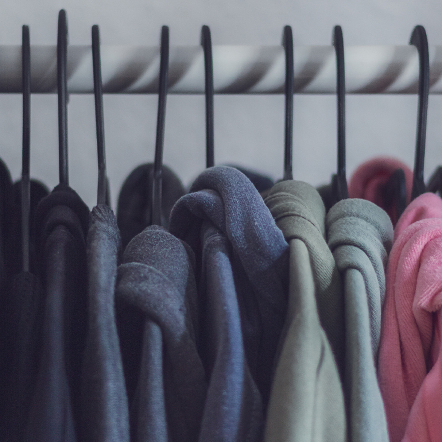 Printful Header 1 Clothes on a clothesrack