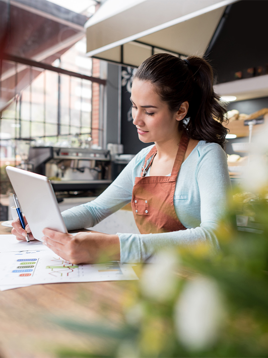Corcentric Portrait 1 woman working on tablet