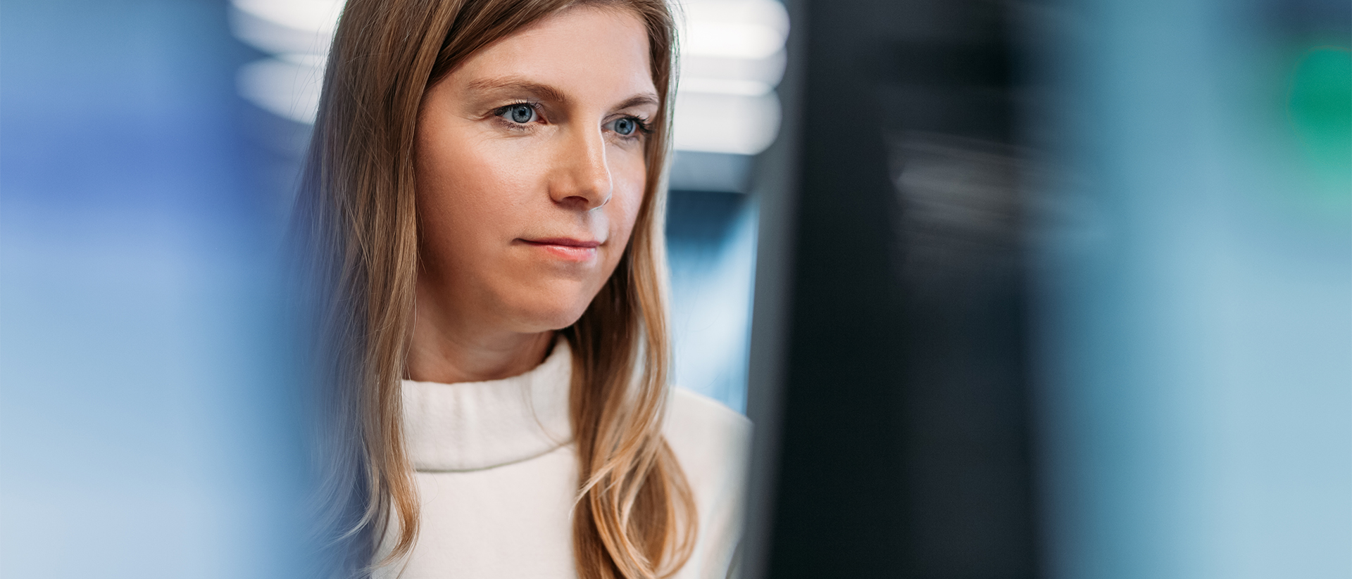 Kiteworks header image woman close up at screen