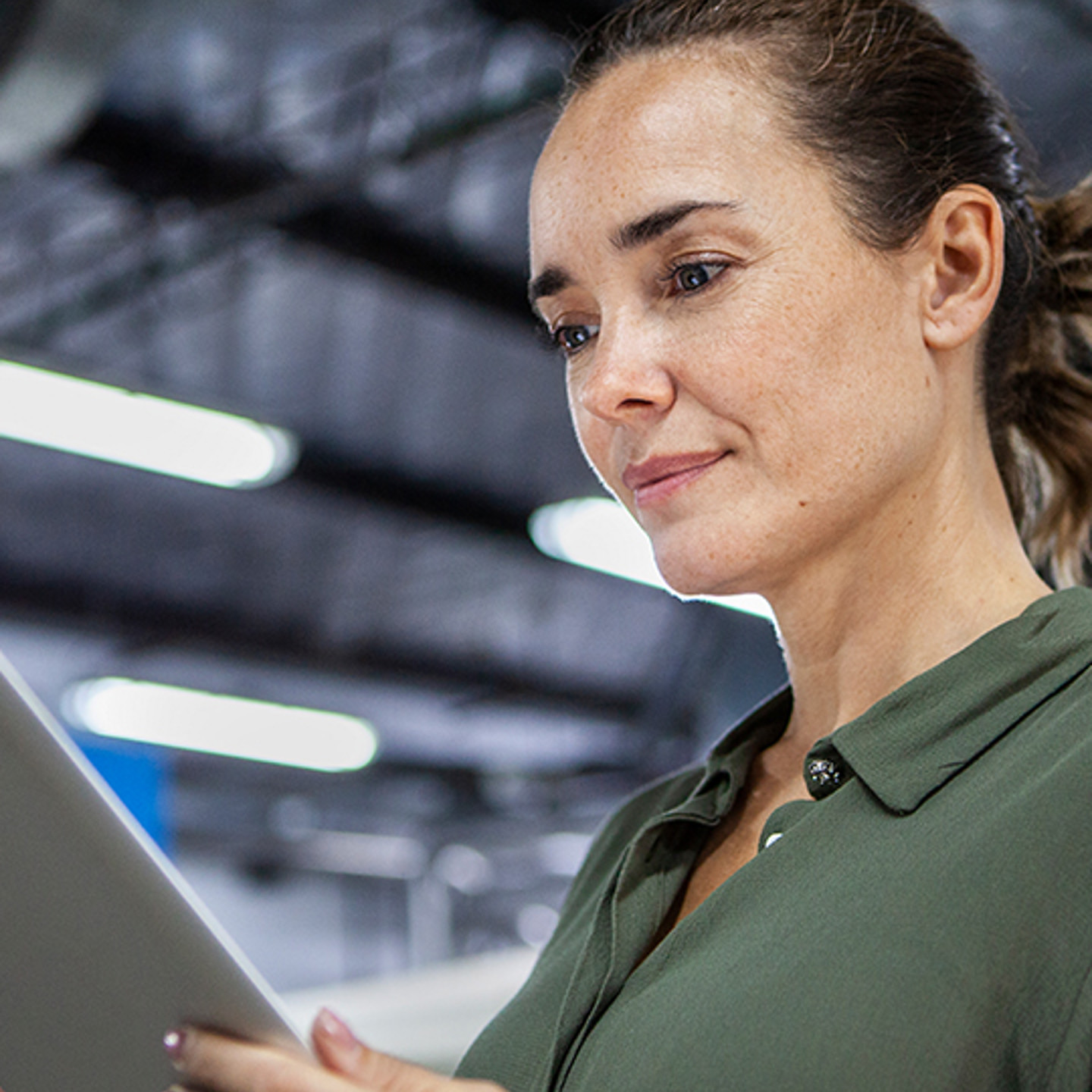 Woman looking at a tablet image