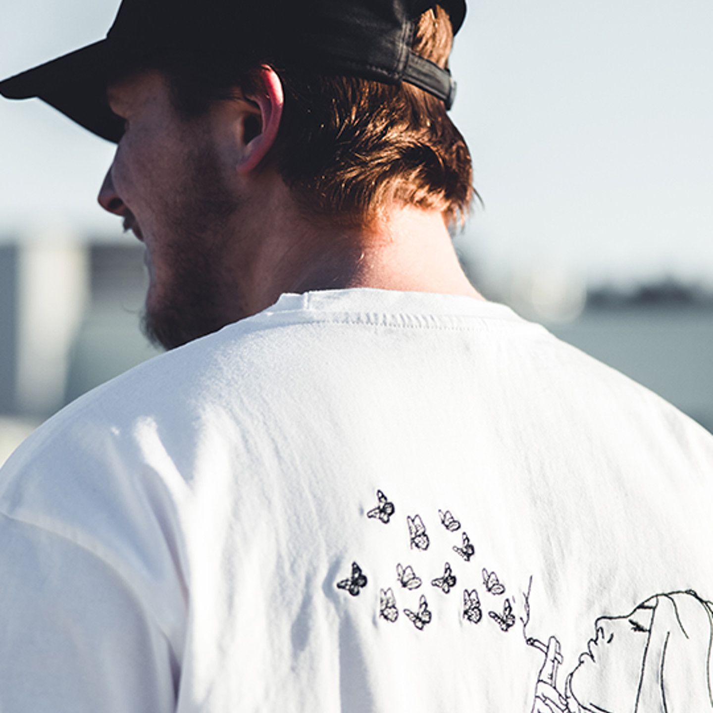 Printful Portrait man in cap and tshirt