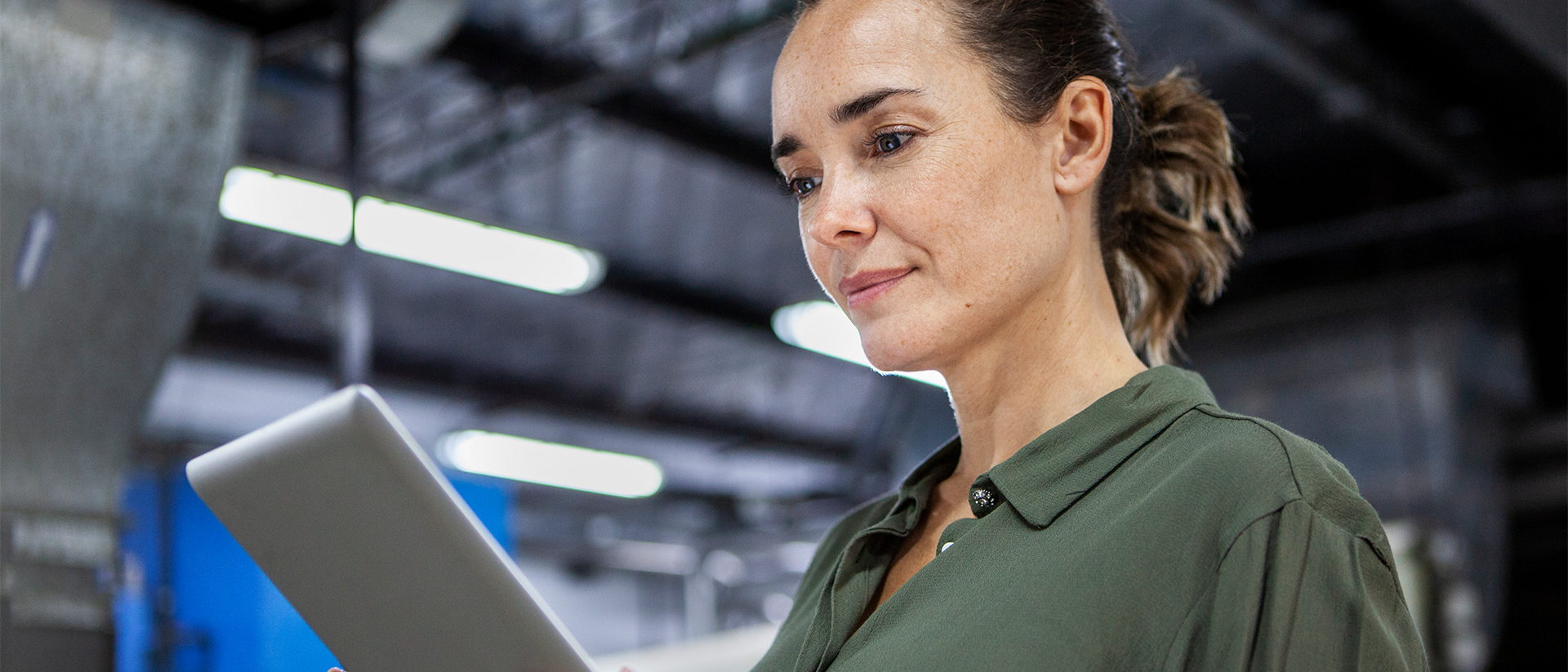 Trade Global Header 3 image of woman looking at tablet