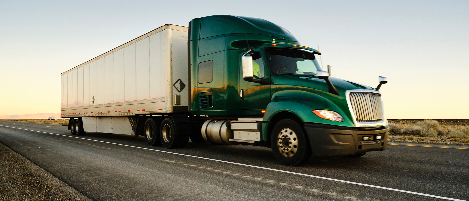 Transflo Header 3 image of truck driving on road