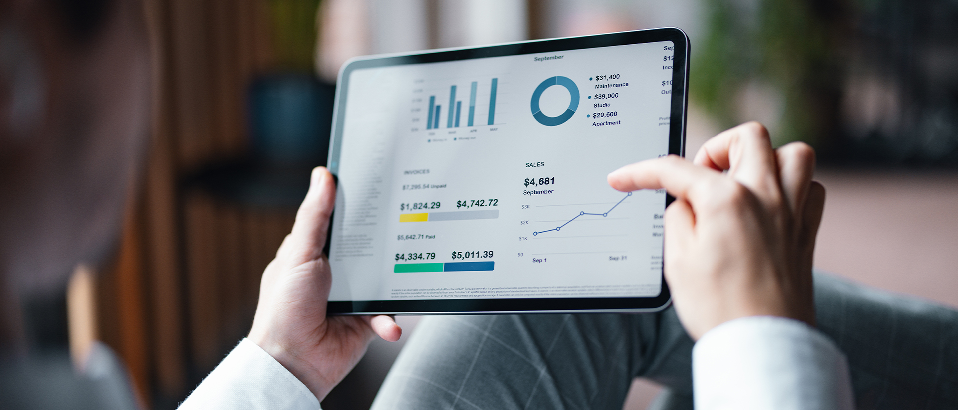 Adreima header image graphs on tablet