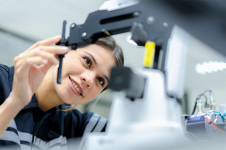 Lux Research Landscape 3 woman looking at technical gear