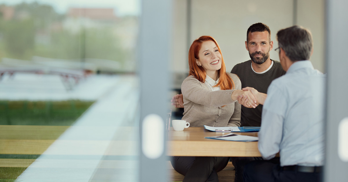 Openlending Header 3 people shaking hands