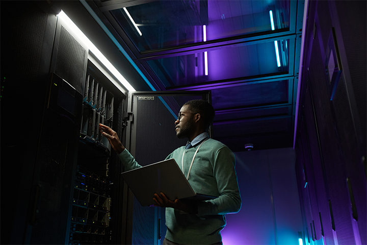 man looking at computer sensors